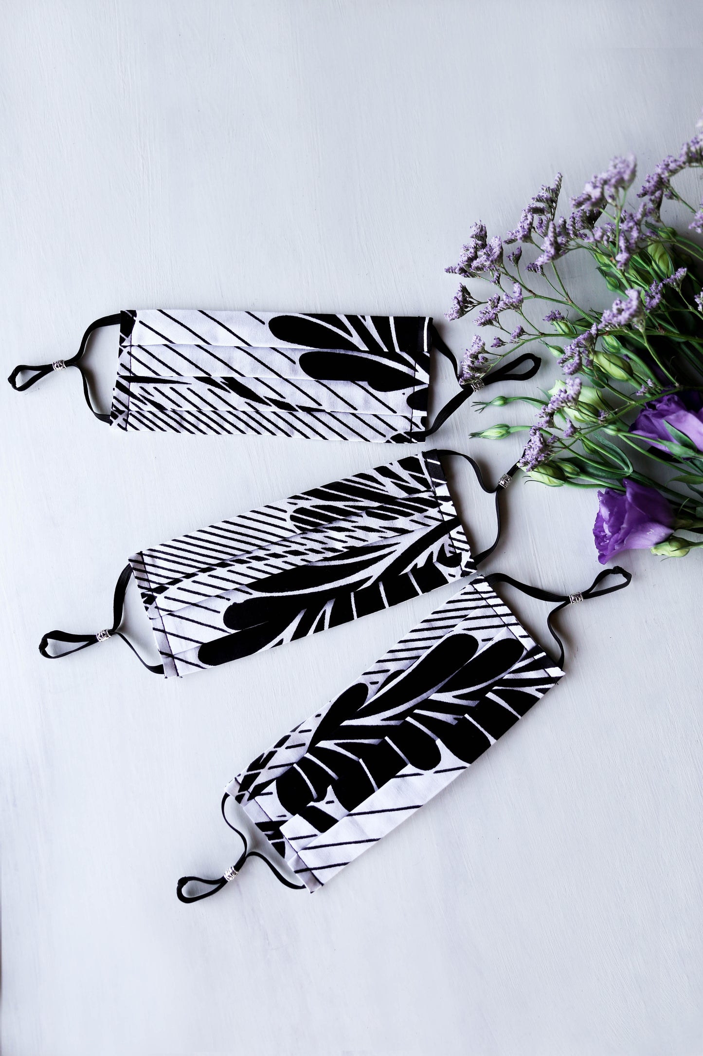Stripin' Palm Leaves Floral Face Mask (Black/White) with Adjustable Ear Loops