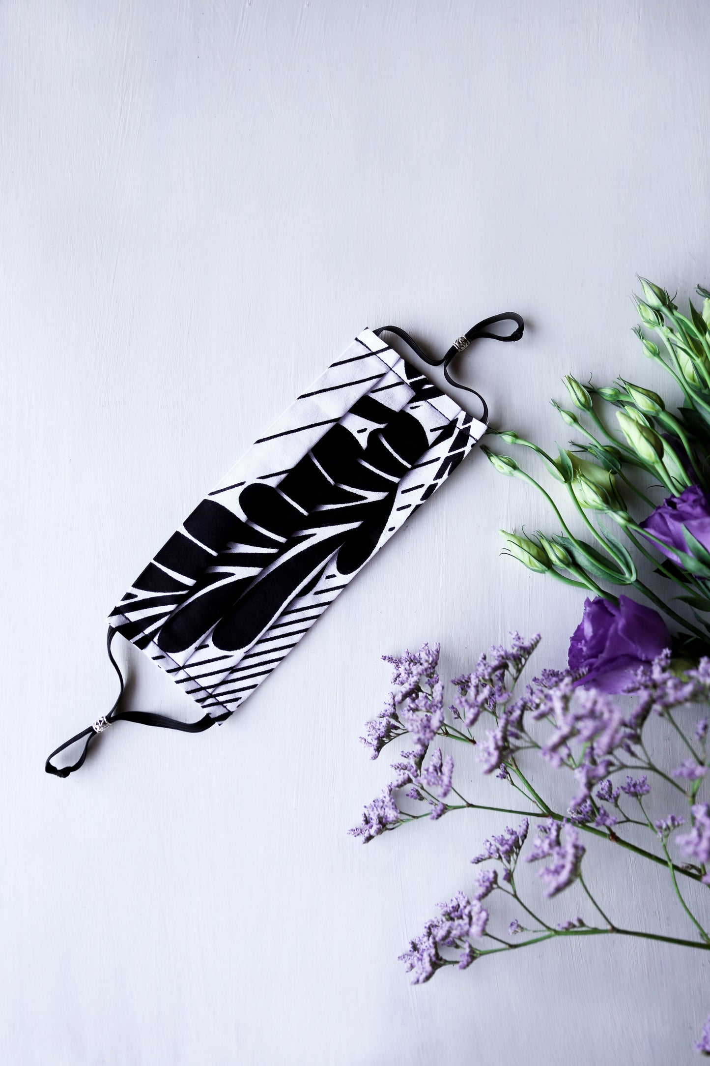Stripin' Palm Leaves Floral Face Mask (Black/White) with Adjustable Ear Loops